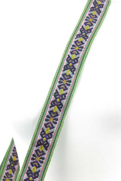 Grüner Kameraband von Glueck & Fund, flexibler Taschengurt für Kamera- und Accessoire-Trage, aus robustem Material.