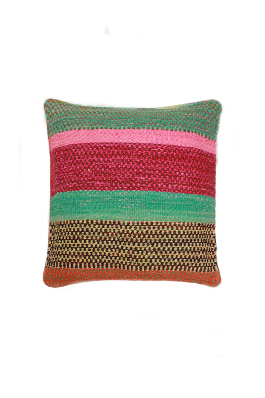 Türkisgrünes Frazadakissen 45x45 cm aus Peru von Glueck und Fund, weiches Textil mit buntem Muster.